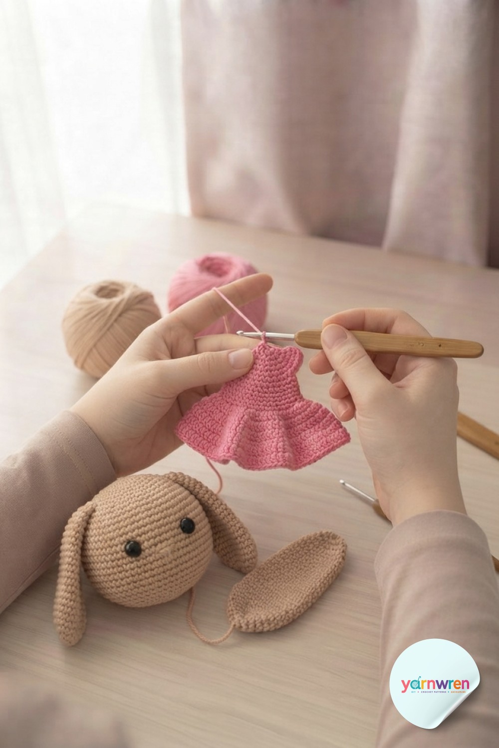 Crocheting the tiny pink ruffled skirt destined for the finished crochet puppy amigurumi's dress